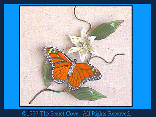 Monarch Butterfly with Lily. B80 Metal wall sculpture by Bovano.